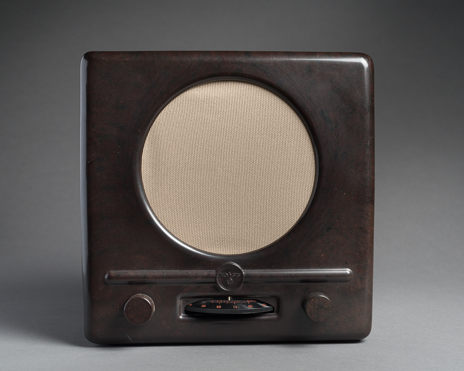 This DKE38 radio model was produced in Germany between 1938 and 1944. The Nazi Reichsadler symbol, an eagle with a swastika, is visible on the front. (Photo: Peter Berra)