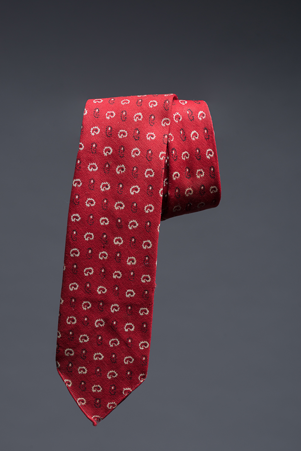 This red tie with a black-and-white abstract pattern belonged to David Honig. He bought it when he was 17 years old after graduating from a Jewish private business school in Krakow, Poland. (Photo: Peter Berra)