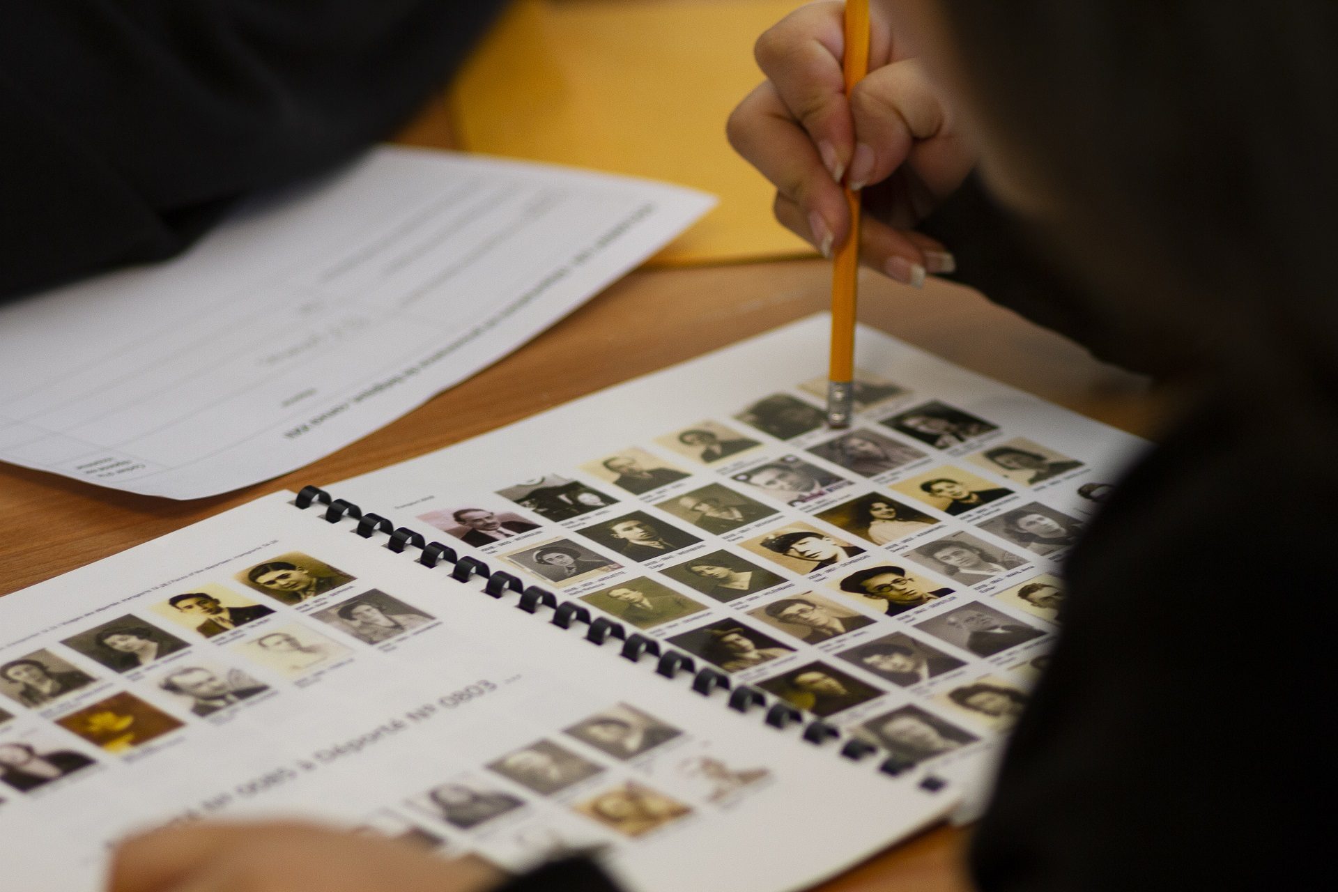 Students learn about the history of the Holocaust through artifacts and analysis sheets from primary sources.
