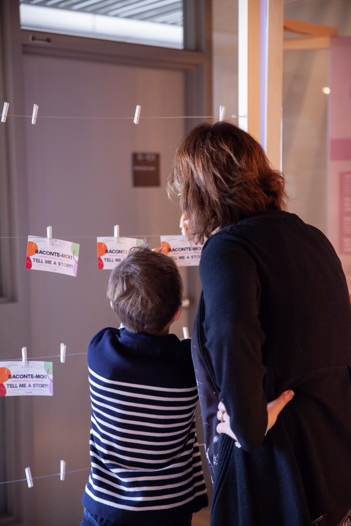 At the end of the exhibition, visitors are invited to write down their thoughts on a small postcard. © Montreal Holocaust Museum, Photography Stéphanie Cousineau-Bourassa