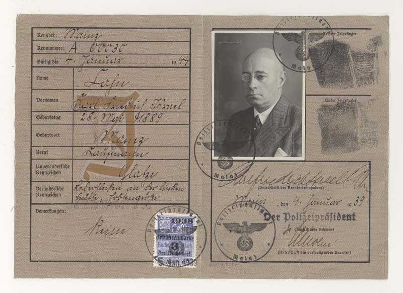 Karl Cahn's identification papers marked with a red "J" identifying him as a Jew. The first name "Israel" was added as a result of a law put in place by the Nazi regime in 1938. 
